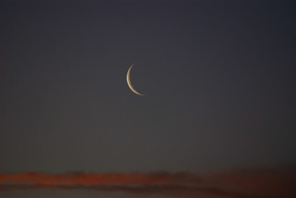 1200px New Moon at sunset