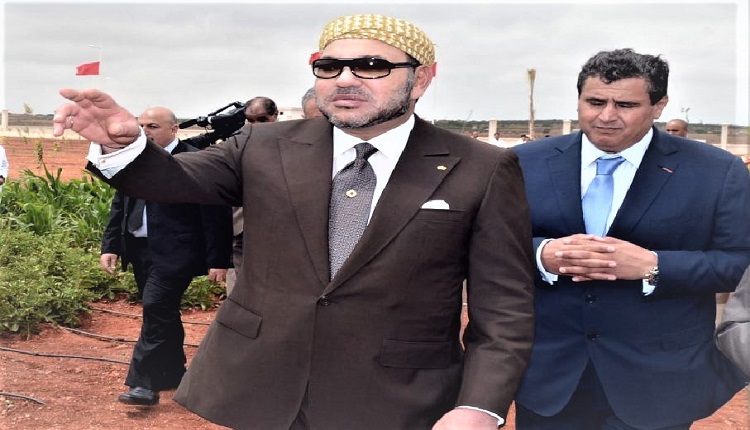 الملك محمد السادس وأخنوش