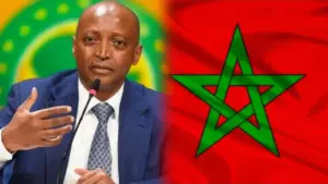 رئيس الكاف والعلم المغربي