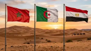 أعلام المغرب ومصر والجزائر بخلفية الصحراء