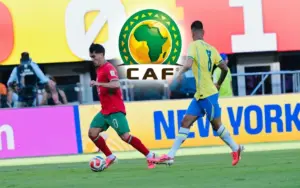 الكاف ولاعب المنتخب المغربي دياز أمام البرازيل ـ صورة مركبة ـ